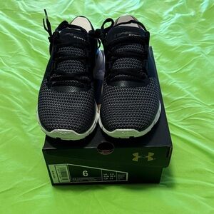 Under Armour charged Black and White Womens athletic shoes